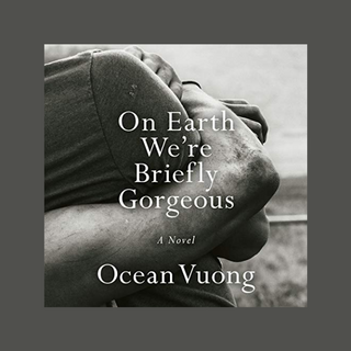 A black and white photo of two people hugging. Only the top right shoulder and arms are on the photo. The title On Earth We're Briefly Gorgeous and author's name Ocean Vuong in white font is centred in the book cover.