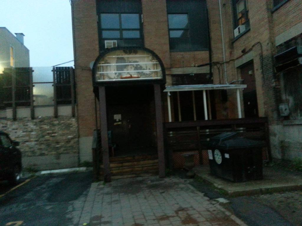 A photo of the outside of Club Renaissance after it closed for business in 2013. The Club Renaissance sign has been removed.