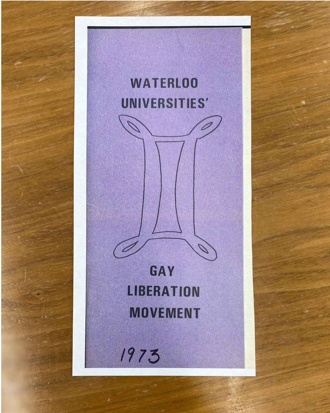 Photo of cover of a pamphlet produced by the Waterloo Universities' Gay Liberation Movement in 1973