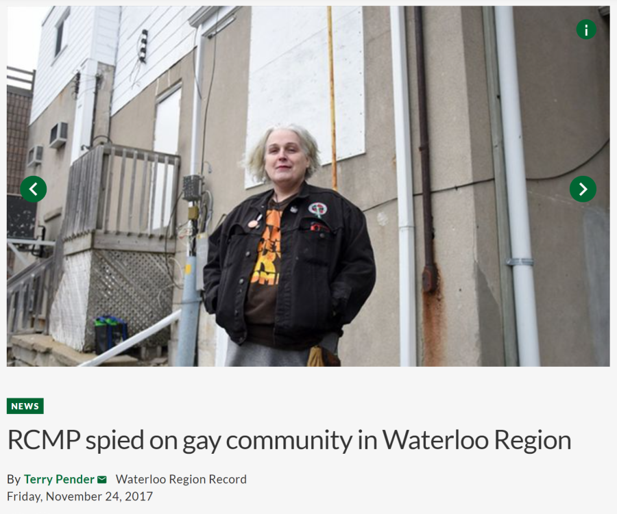 Photo of community member Cait Glasson outside the former location of gay bars Half and Half and The Pink Zone. These clubs operated secretly in the nineteen eighties and nineties off of Gaukel Street and were surveilled by the RCMP for homosexual activity.
