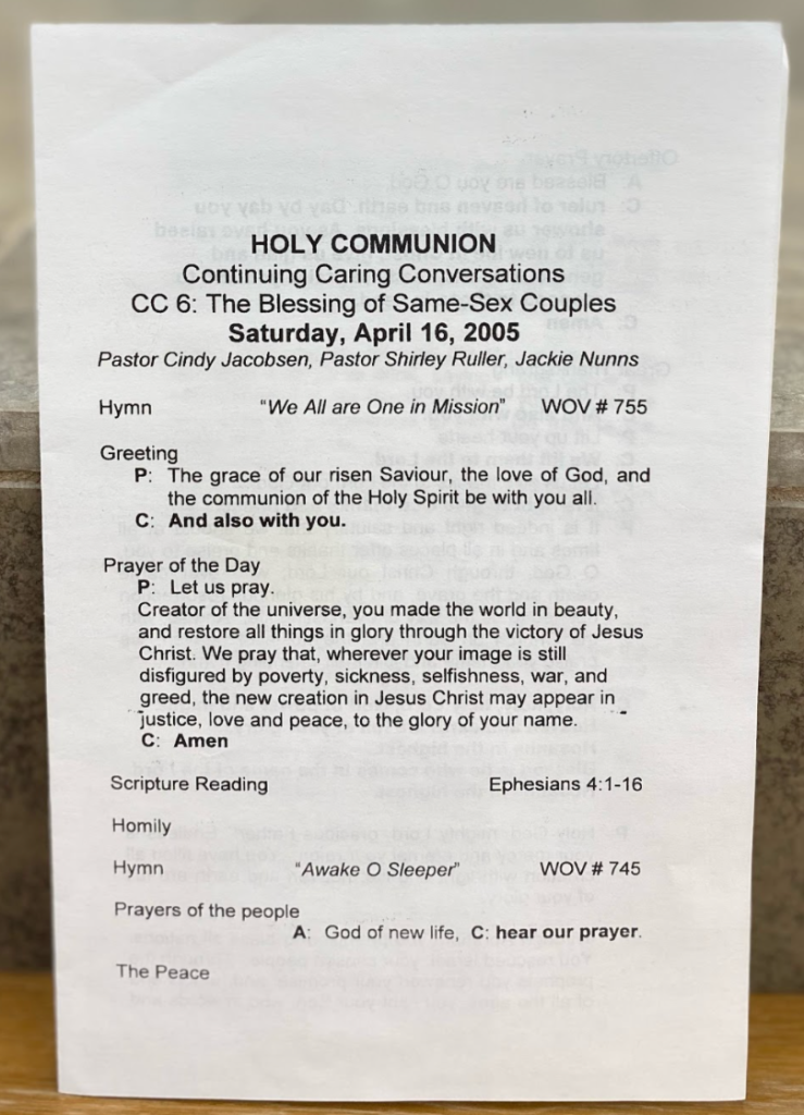 A photo of a program for holy communion that is titled "continuing caring conversations: The blessing of same sex couples". This was produced by St Peter's Lutheran church in 2005. April 16 2005.
